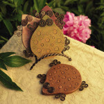 Terracotta Frog Coasters in Wire Stand